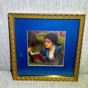 Reproduction of Charles Edward Perugini’s “Idle Moments”.